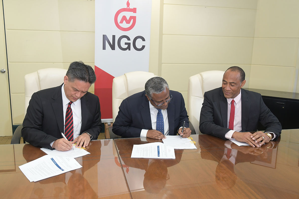 Left to Rright: NGC President, Mark Loquan; ENH Chairman/CEO, Dr. Omar Mithá and NGC Chairman, Gerry C. Brooks signing the Technical Services Agreement at NGC Head Offices on Monday 13th May, 2017 